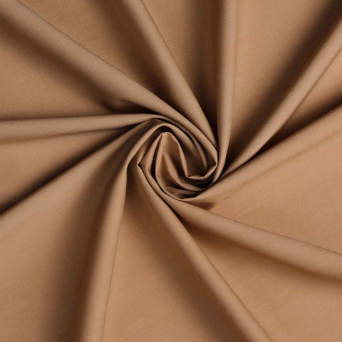 Close-up of brown fabric with folds