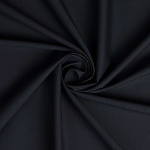 Close-up of dark blue fabric with a swirl pattern