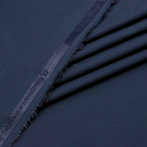 Close-up of dark blue fabric with a subtle pattern