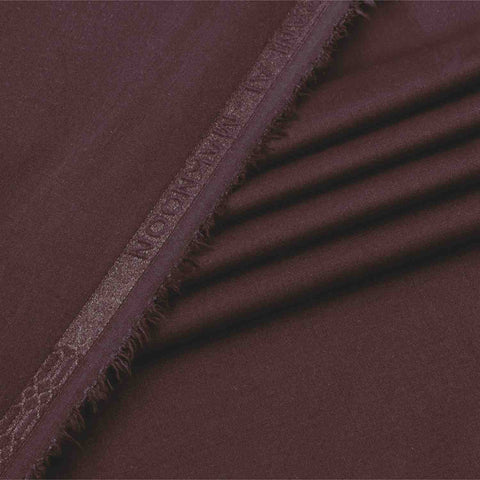 Close-up of a brown fabric with frayed edge