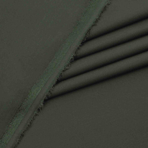 Dark green fabric with a textured border
